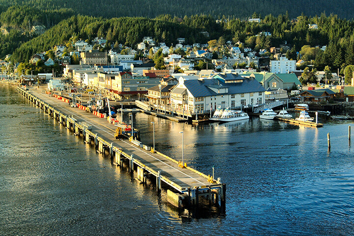 Town on the water with a long pier 